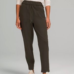 Lululemon keep moving stretch high-rise pant 7/8 length olive green size 4